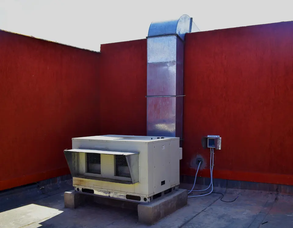 Twin extraction fan unit and duct on the rooftop