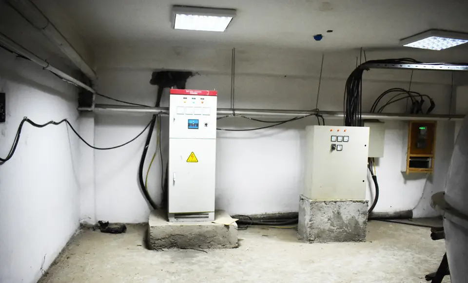 Pump room with electrical control panels