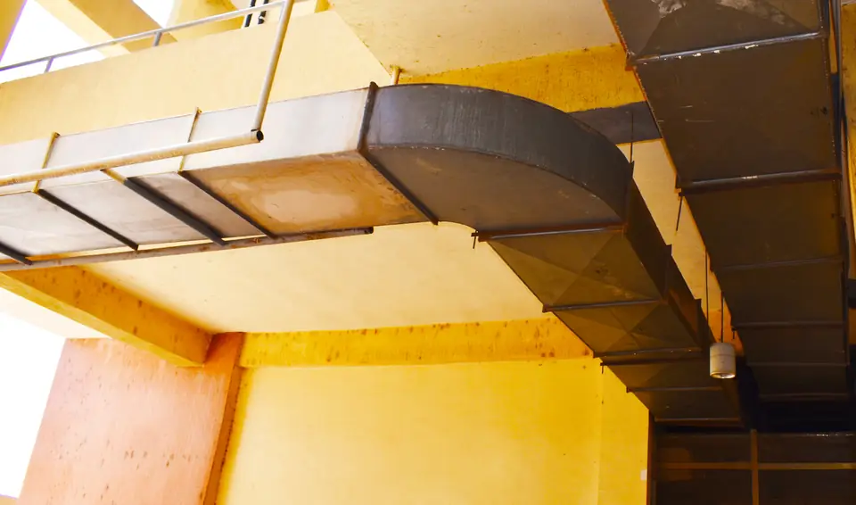 Large duct under the yellow stand structure