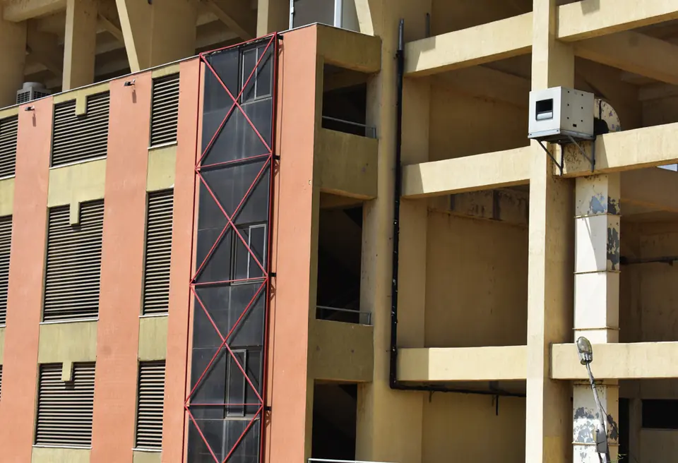 Stadium facade with a wall-mounted unit