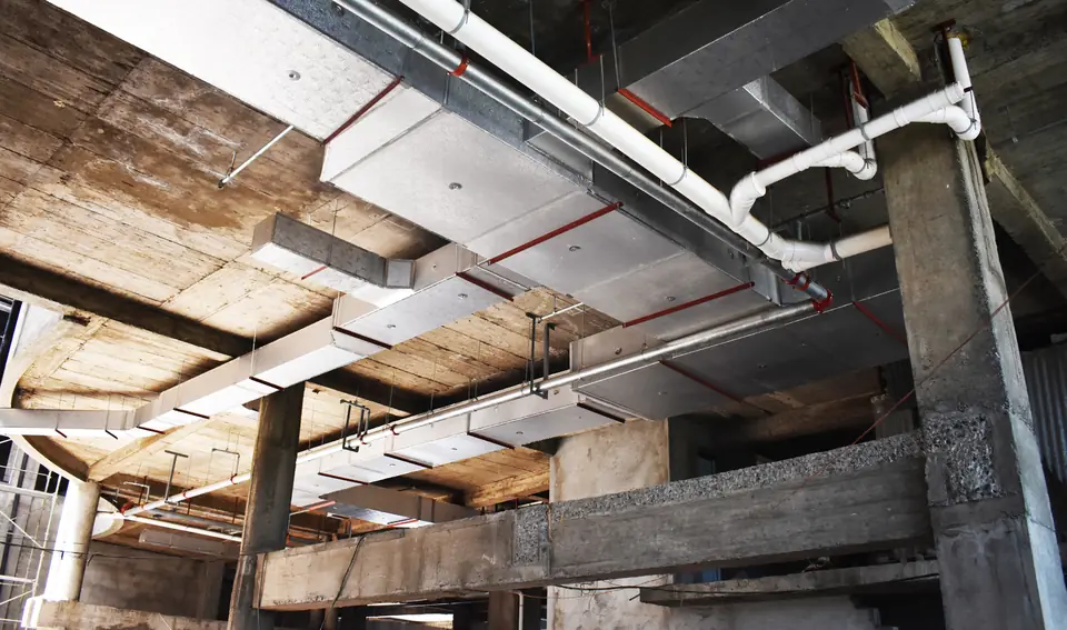 Phenolic ducts running under a concrete ceiling